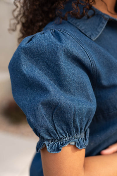 Close up of the sleeve on the denim puff sleeve top