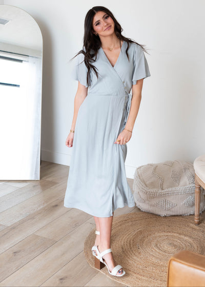 V-neck dusty blue wrap dress