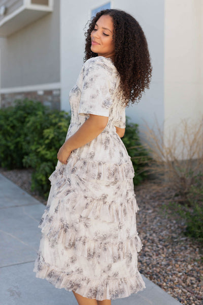 Side view of the grey flroal tiered dress