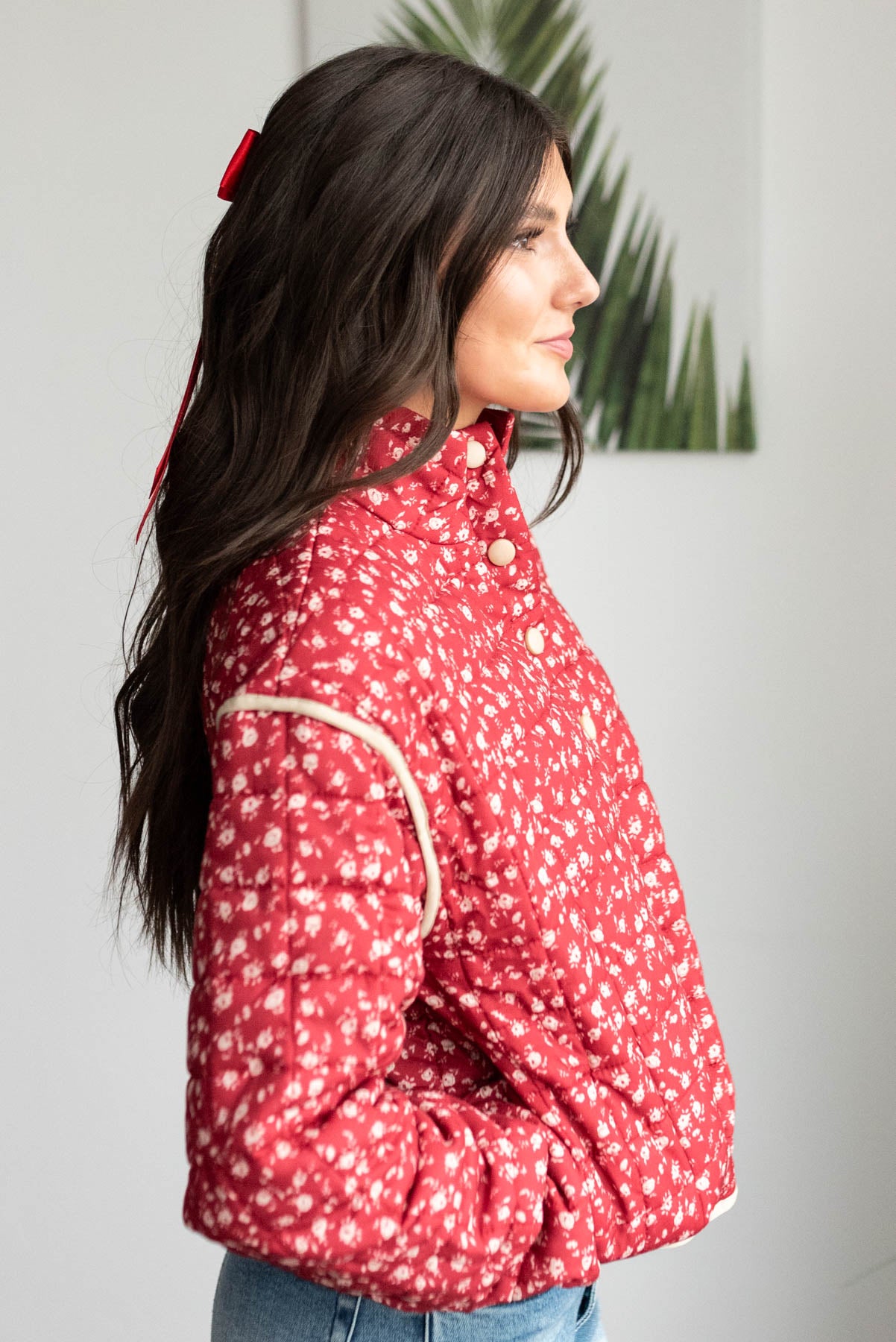 Side view of the red flroal quilted jacket