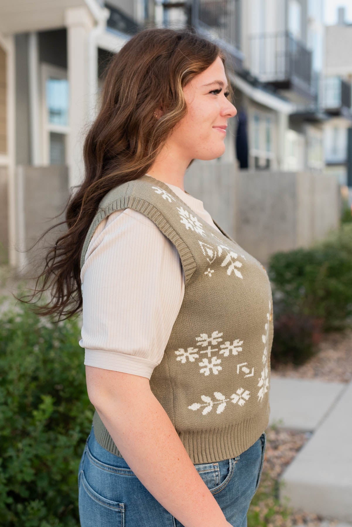 Side view of the plus size light olive florla sweater vest