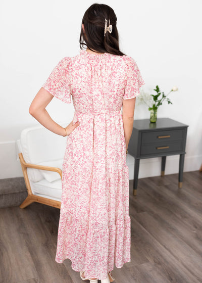 Back view of the pink floral tiered dress