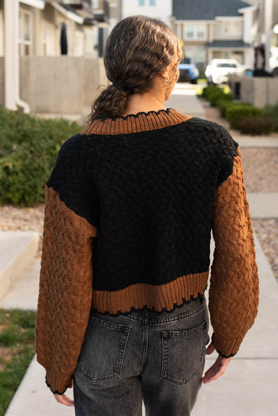 Back view of the black knit cardigan