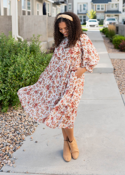 Long sleeve cream floral tiered dress