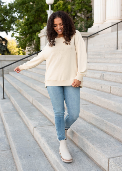 Long sleeve beige embroidered bow pullover