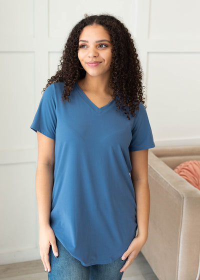 Front view of the classic blue v-neck top