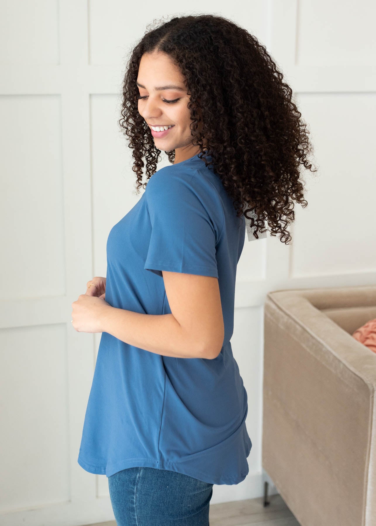 Side view of the classic blue v-neck top