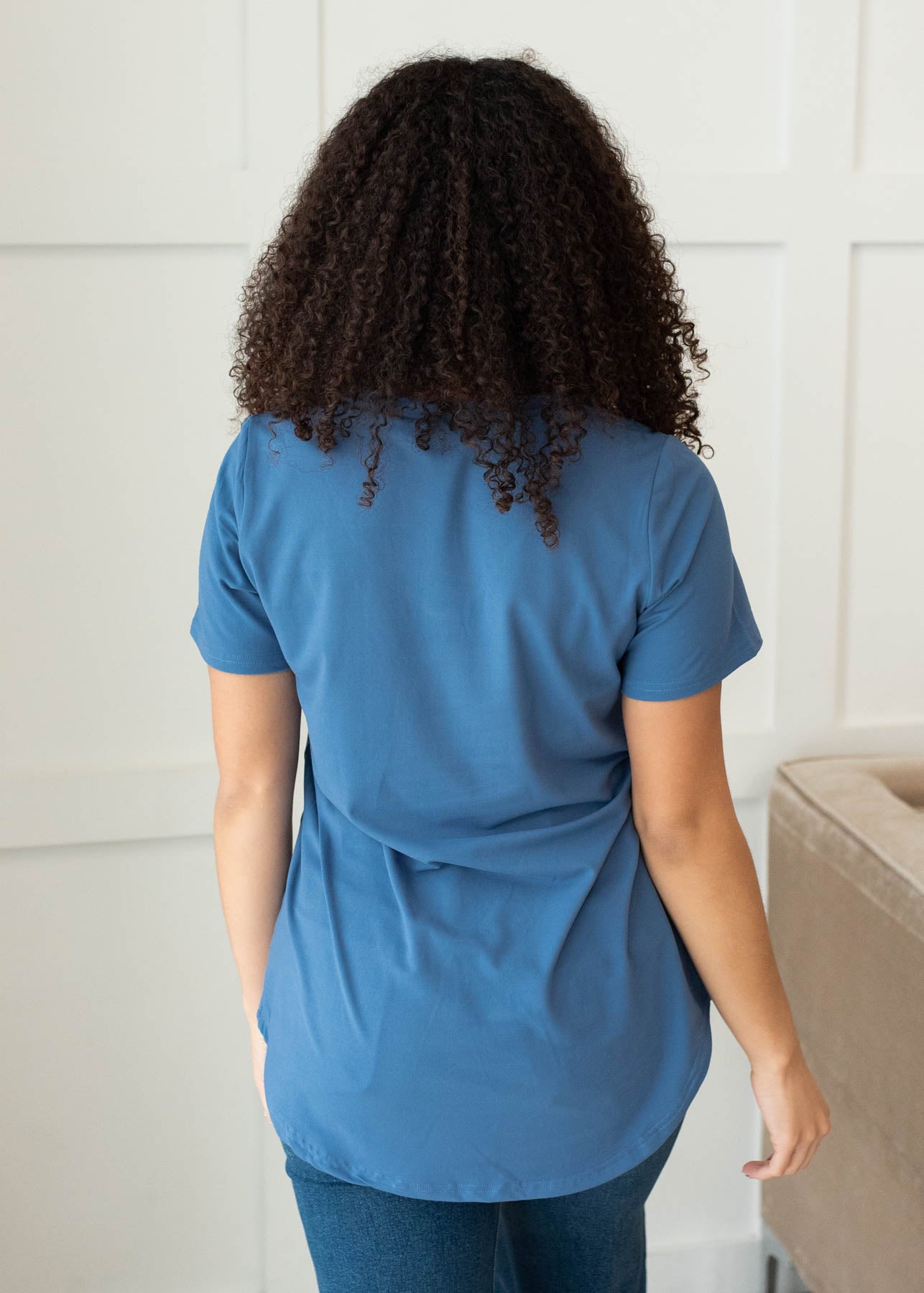 Back view of the classic blue v-neck top