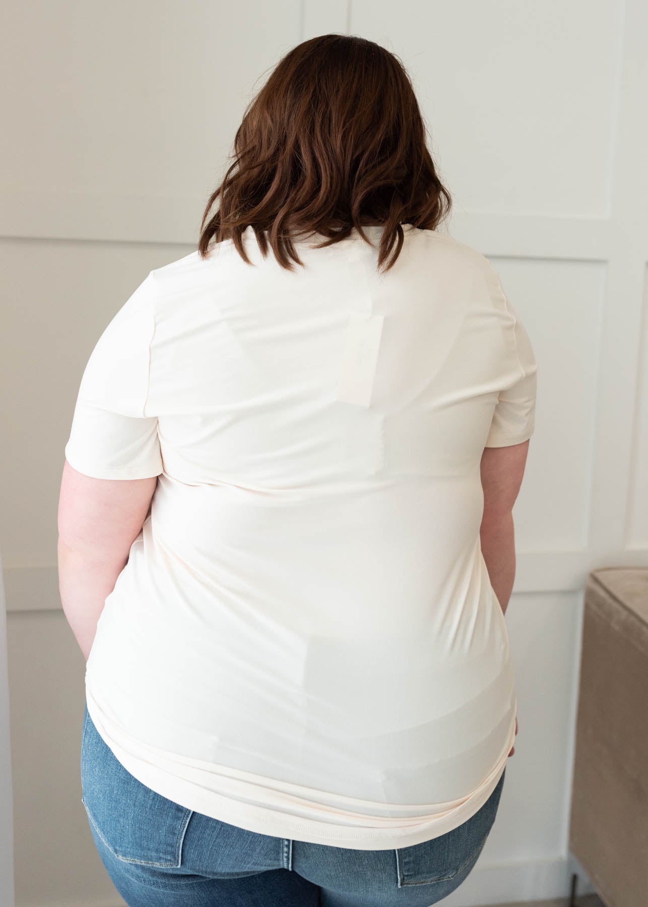 Back view of the classic cream v-neck top in plus size