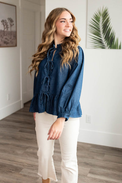 Dark denim bow top with long sleeves