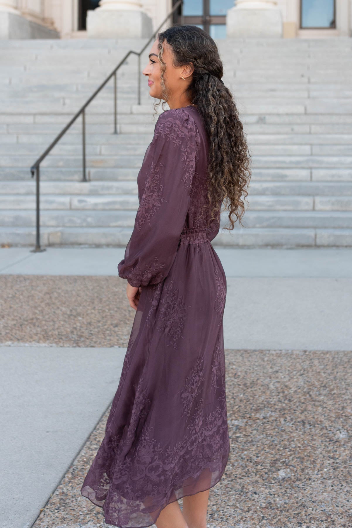 Side view of the dusty plum embroidered chiffon dress