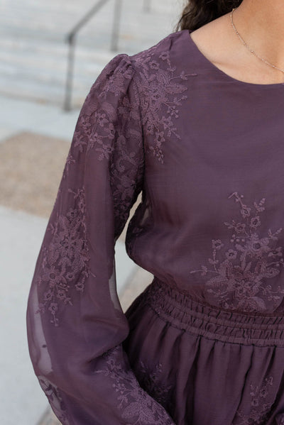 Close up of the fabric on the dusty plum embroidered chiffon dress