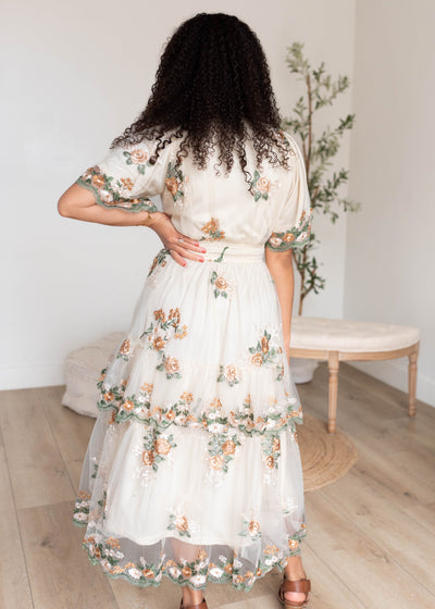 Back view of the wild flower taupe dress