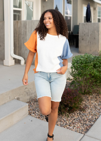 Short sleeve blue orange color block top