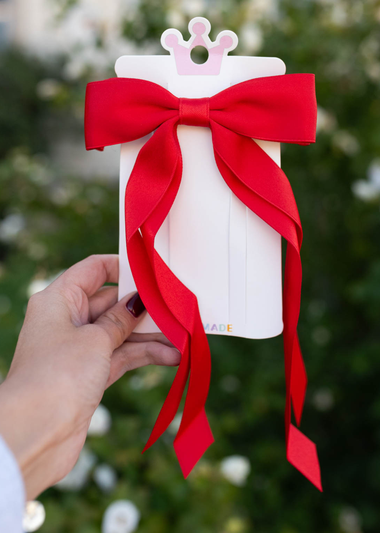 Red double ribbon bow