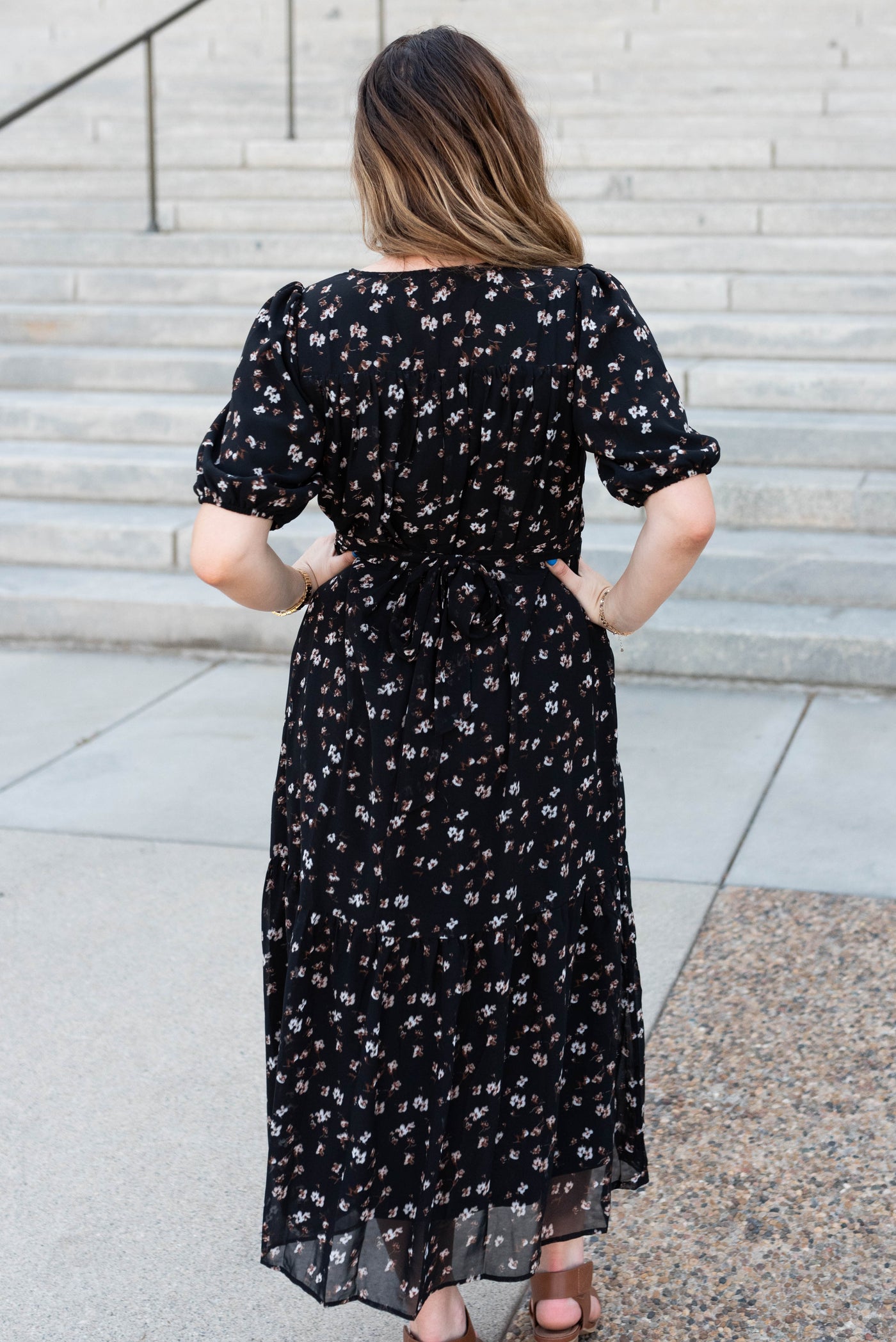 Back view of the black floral smocked dress