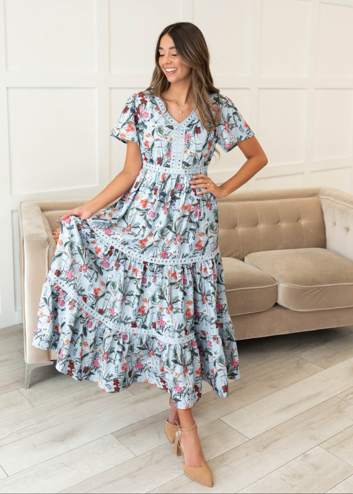 Blue floral tiered dress with lace trim and short sleeves