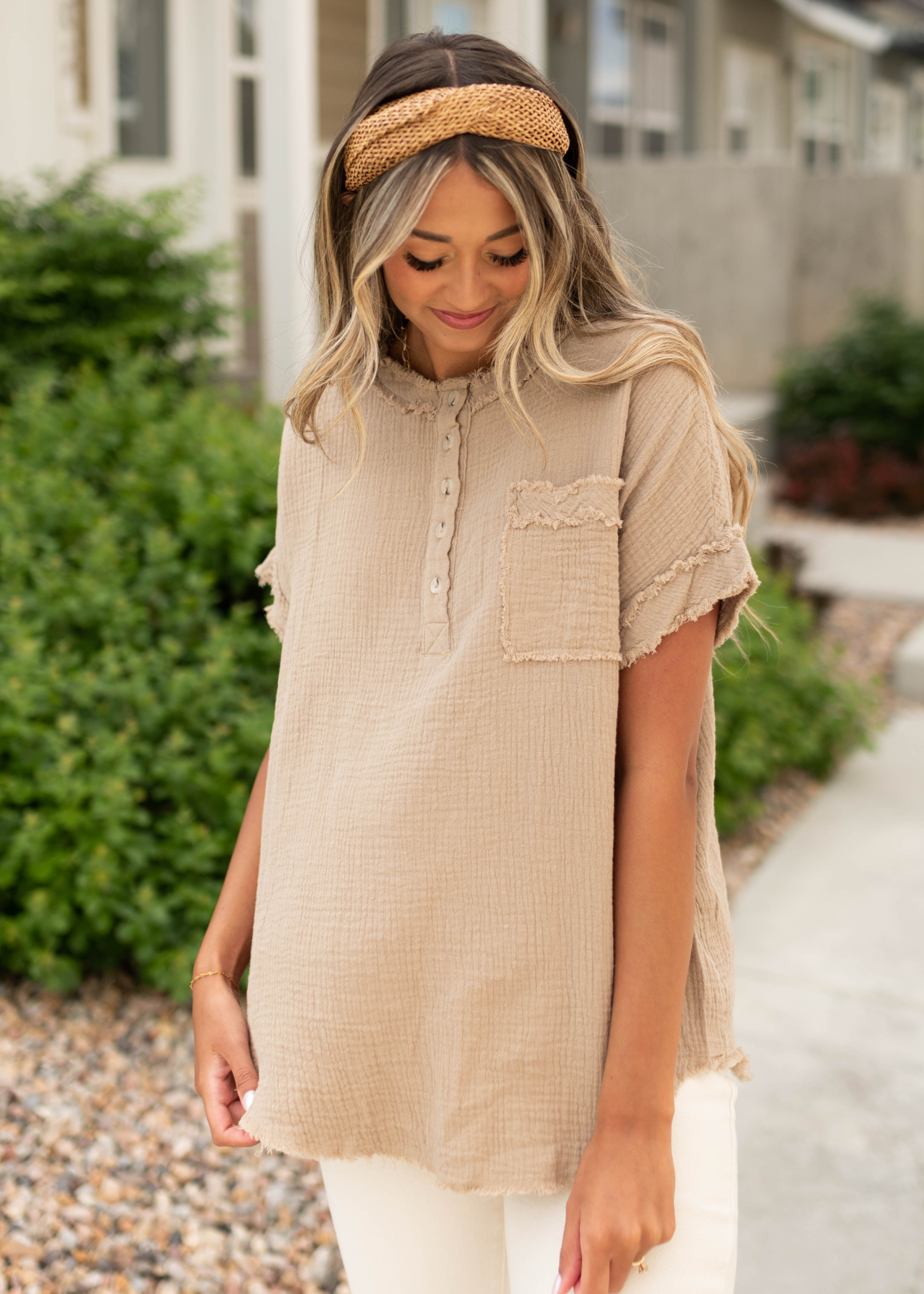 Short sleeve tan top with a pocket